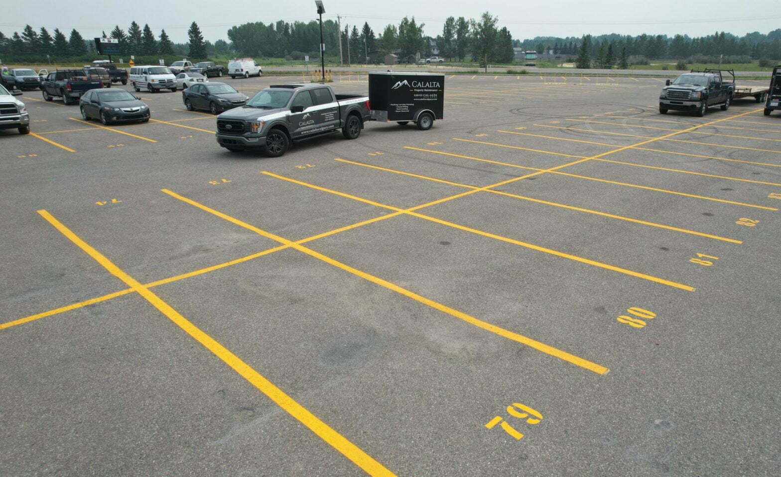 line painting and stenciling in parking lot