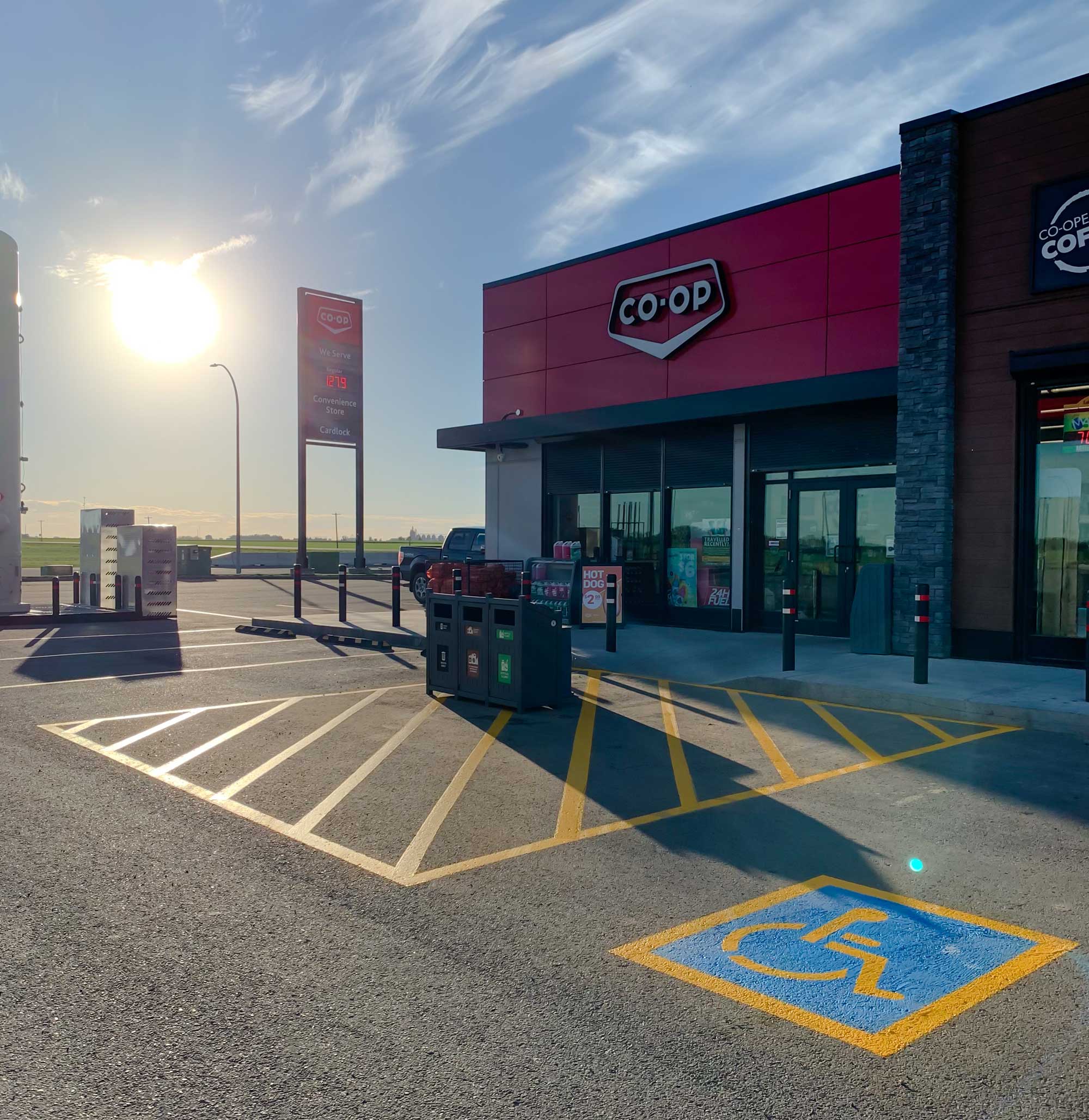 CO-OP building and asphalt driveway with line painting