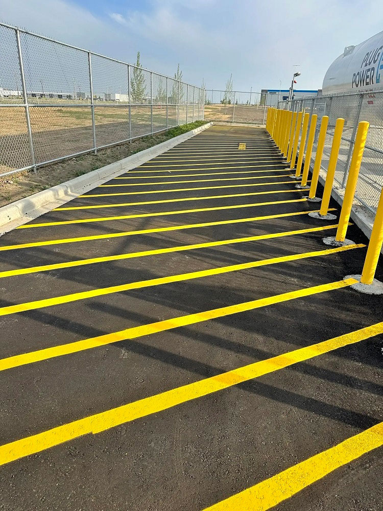 Asphalt Path with yellow line painting